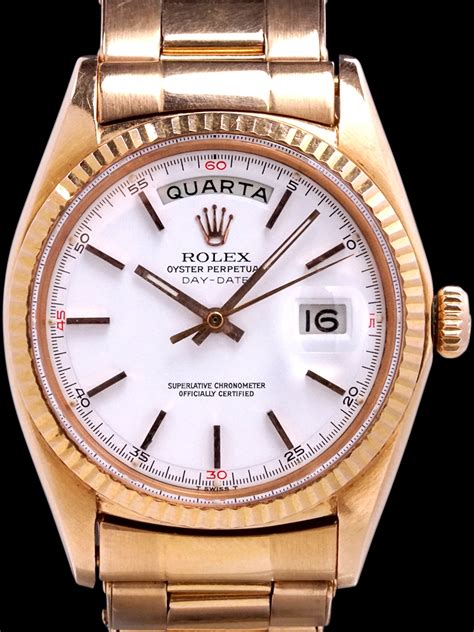 rolex day date red quarters